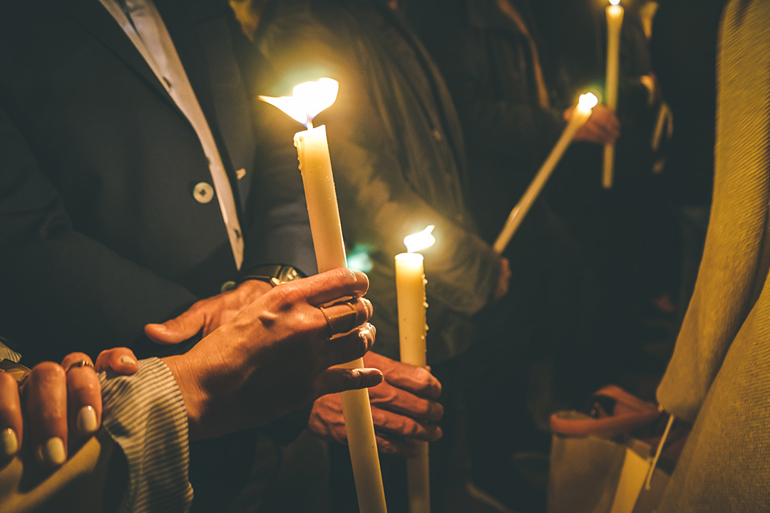 worshippers standing together at a Christmas service